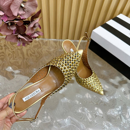 AQUAZZURA 26S SLINGBACK PUMPS 105 MM IN GOLD CALFSKIN WITH CRYSTAL