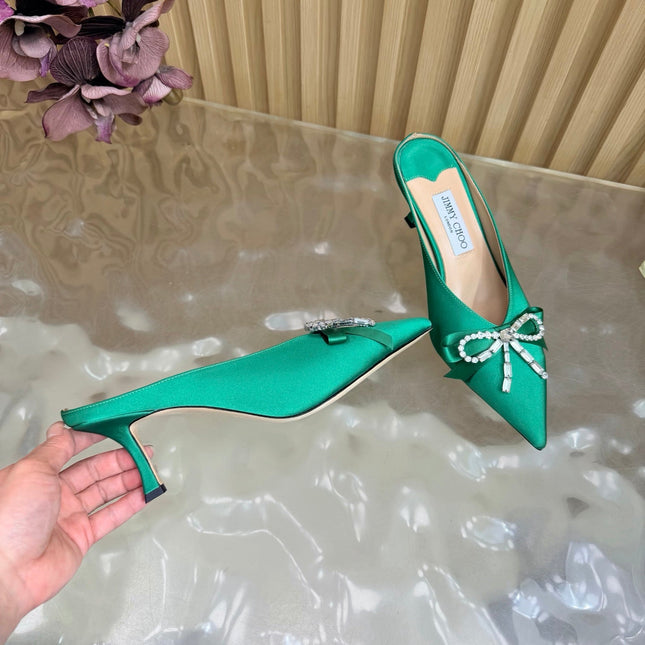 JIMMY CHOO 26S HIGH-HEELED MULES 65 MM IN GREEN SATIN WITH RHINESTONE BOW