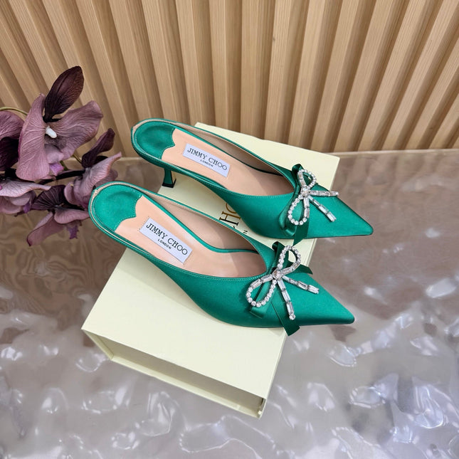 JIMMY CHOO 26S HIGH-HEELED MULES 65 MM IN GREEN SATIN WITH RHINESTONE BOW