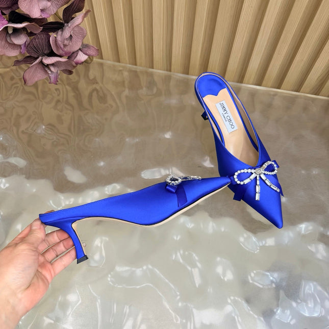 JIMMY CHOO 26S HIGH-HEELED MULES 65 MM IN NAVY BLUE SATIN WITH RHINESTONE BOW