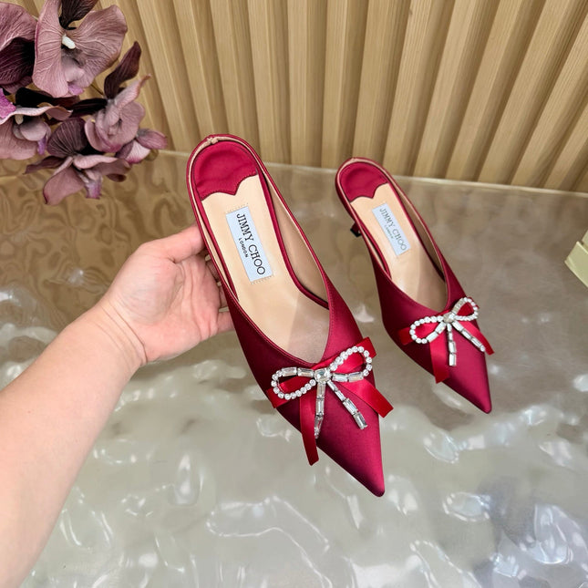 JIMMY CHOO 26S HIGH-HEELED MULES 65 MM IN RED SATIN WITH RHINESTONE BOW