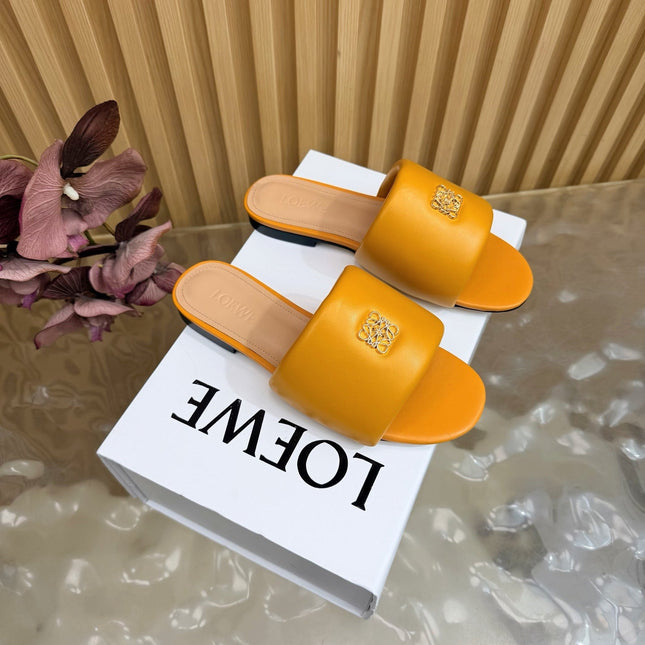 LOEWE 26S SLIDE SANDALS IN MUSTARD YELLOW ANAGRAM PADDED LAMBSKIN