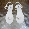 CELINE 26S TRIOMPHE JELLY THONG SANDALS IN WHITE TPU GOLD HARDWARE