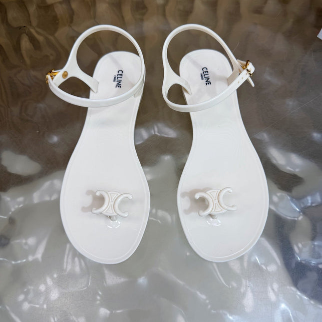 CELINE 26S TRIOMPHE JELLY THONG SANDALS IN WHITE TPU GOLD HARDWARE