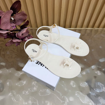 CELINE 26S TRIOMPHE JELLY THONG SANDALS IN WHITE TPU GOLD HARDWARE