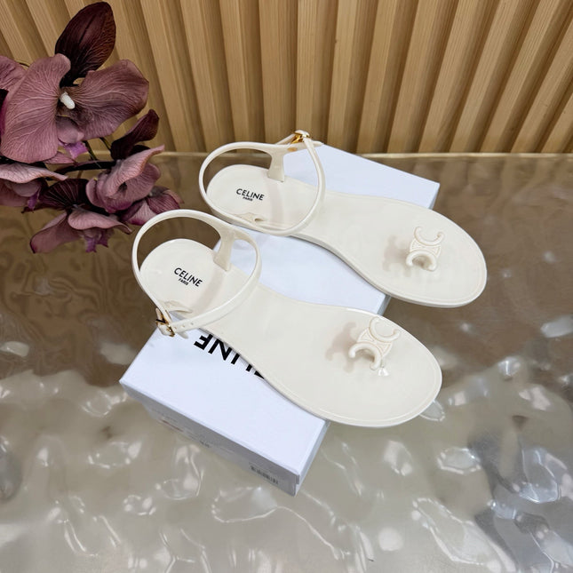 CELINE 26S TRIOMPHE JELLY THONG SANDALS IN WHITE TPU GOLD HARDWARE