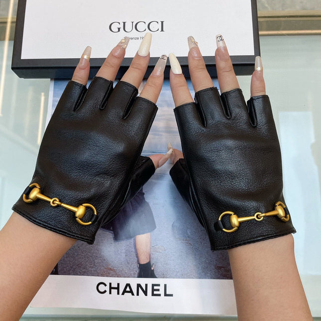 FINGERLESS GLOVES IN BLACK LAMBSKIN WITH GOLD HORSEBIT 432606