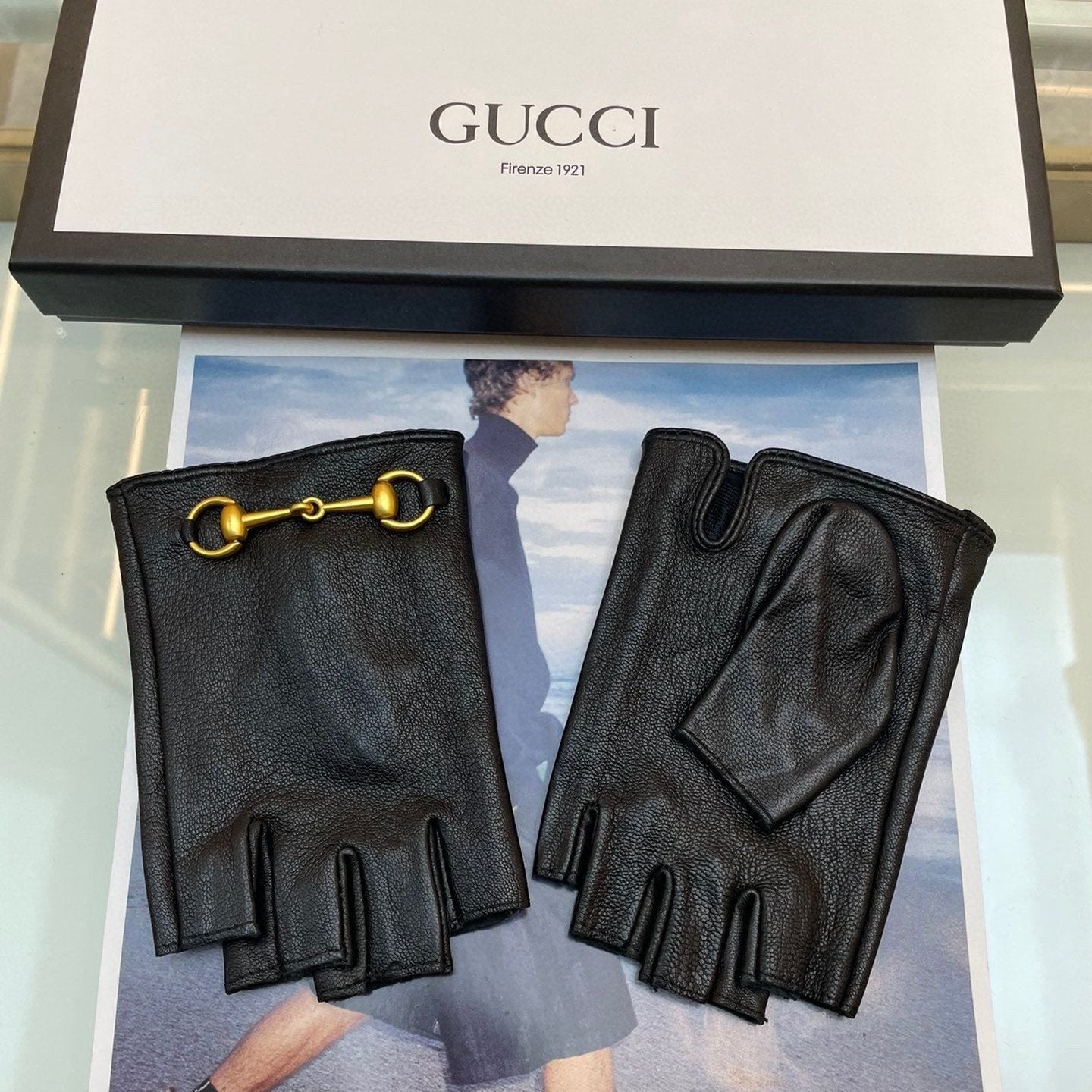 FINGERLESS GLOVES IN BLACK LAMBSKIN WITH GOLD HORSEBIT 432606