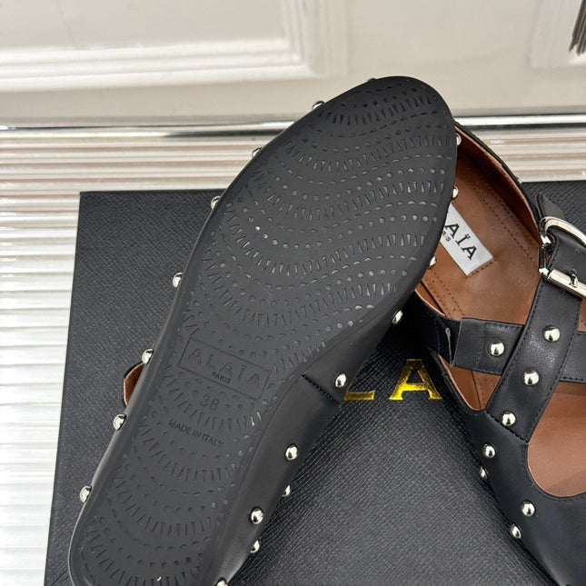 CROSSED STRAP BALLET FLATS IN BLACK CALFSKIN