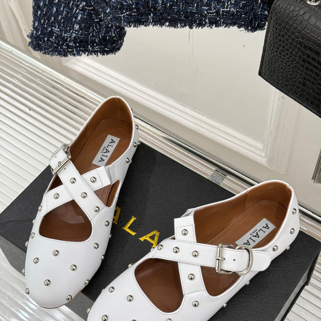 CROSSED STRAP BALLET FLATS IN WHITE CALFSKIN