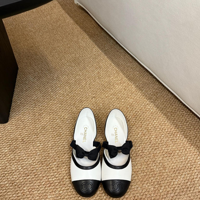 CHANEL 26S MARY JANE SLINGBACK FLATS IN WHITE AND BLACK CALFSKIN CAP TOE RIBBON STRAP