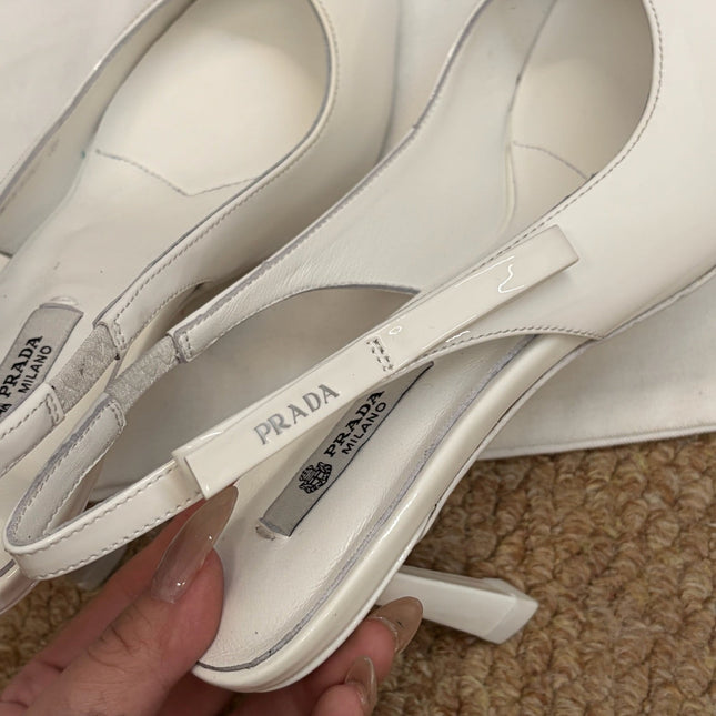 PRADA 26S SLINGBACK PUMPS IN WHITE PATENT CALFSKIN