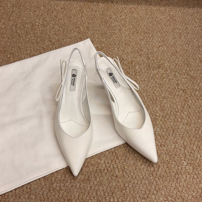 PRADA 26S SLINGBACK PUMPS IN WHITE PATENT CALFSKIN
