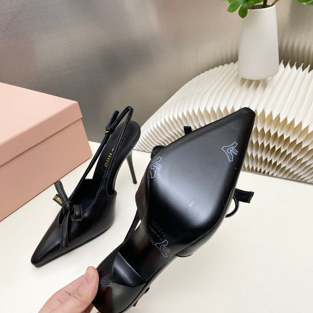 MIUMIU 26S SLINGBACK PUMPS 105MM IN BLACK CALFSKIN WITH BOW
