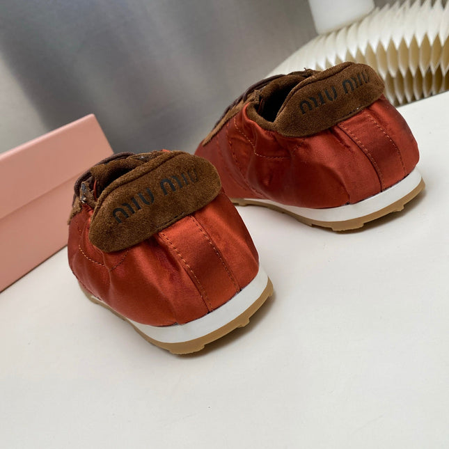 MIUMIU 26S SNEAKERS IN RUST RED PLUME SATIN