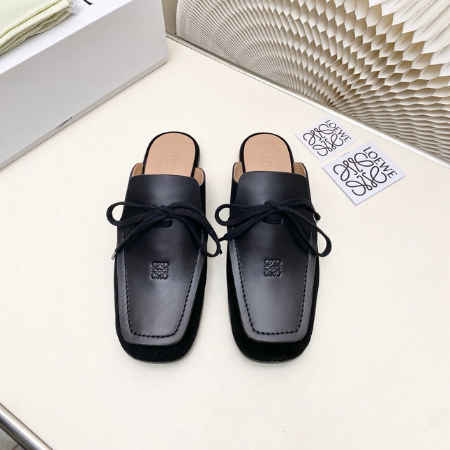 LOEWE 26S FLAT MULES IN BLACK CALFSKIN AND SUEDE