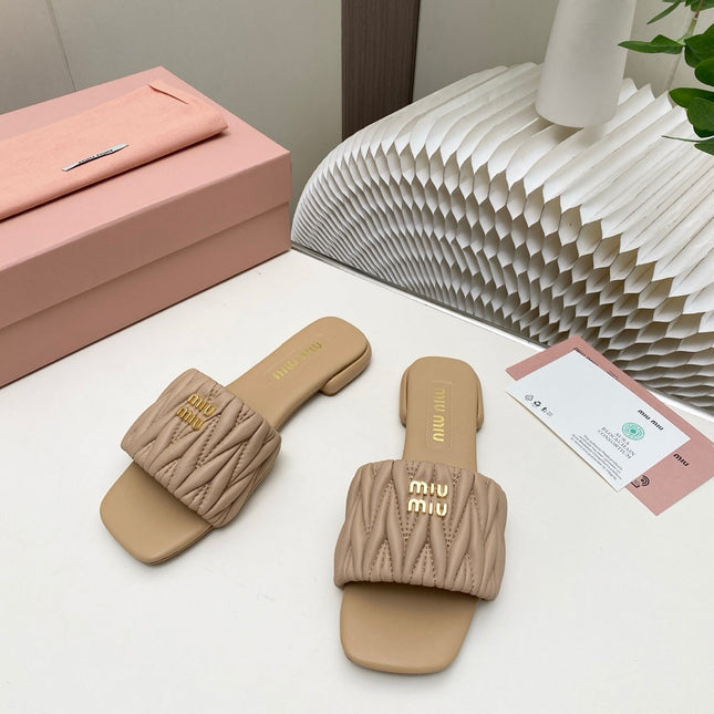 MIUMIU 26S MATELASSE SLIDES IN BEIGE CALFSKIN