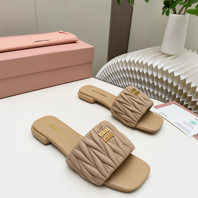 MIUMIU 26S MATELASSE SLIDES IN BEIGE CALFSKIN