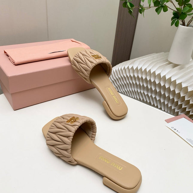 MIUMIU 26S MATELASSE SLIDES IN BEIGE CALFSKIN