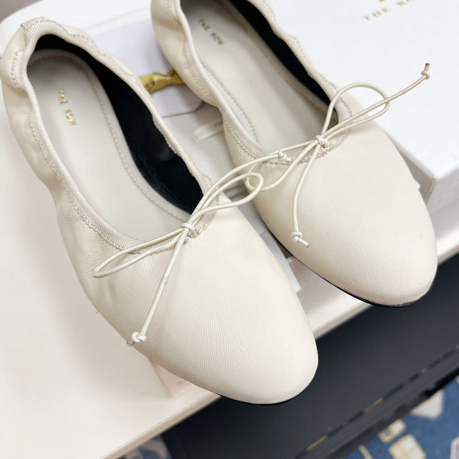 THE ROW 26S BALLET FLATS IN IVORY WHITE CALFSKIN ELASTIC TRIM WITH BOW