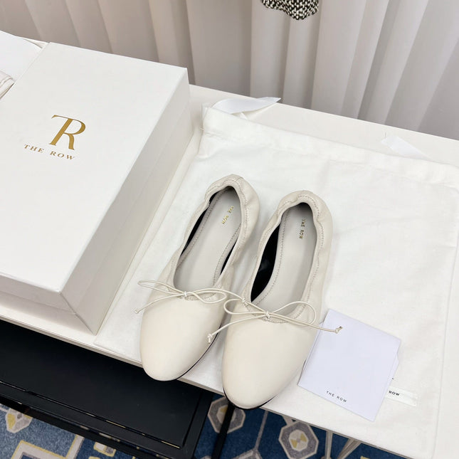 THE ROW 26S BALLET FLATS IN IVORY WHITE CALFSKIN ELASTIC TRIM WITH BOW