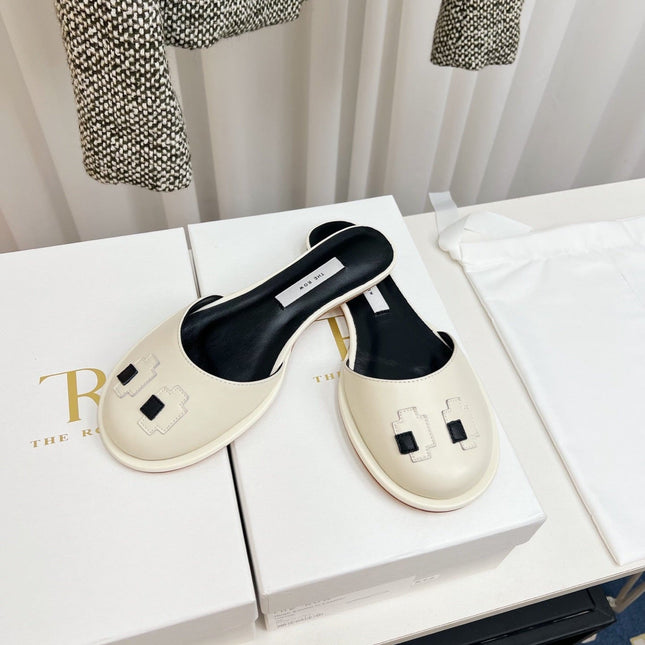 THE ROW 26S PIXEL APPLIQUE MULES IN IVORY WHITE CALFSKIN