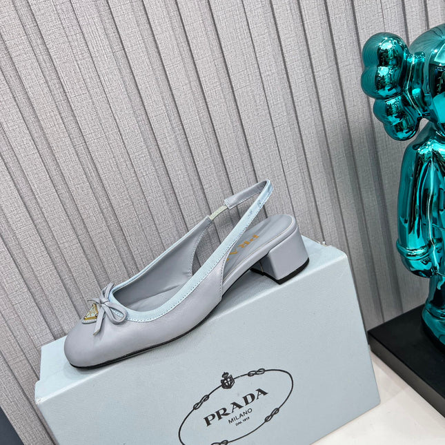 PRADA 26S ROUND TOE SLINGBACK PUMPS 40MM IN LIGHT BLUE CALFSKIN WITH BOW