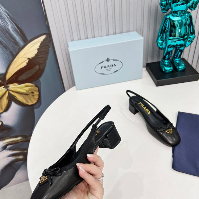 PRADA 26S ROUND TOE SLINGBACK PUMPS 40MM IN BLACK CALFSKIN WITH BOW