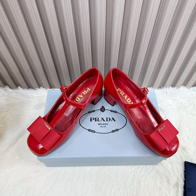 PRADA 26S T-STRAP MARY JANE PUMPS 40MM IN RED PATENT CALFSKIN WITH BOW