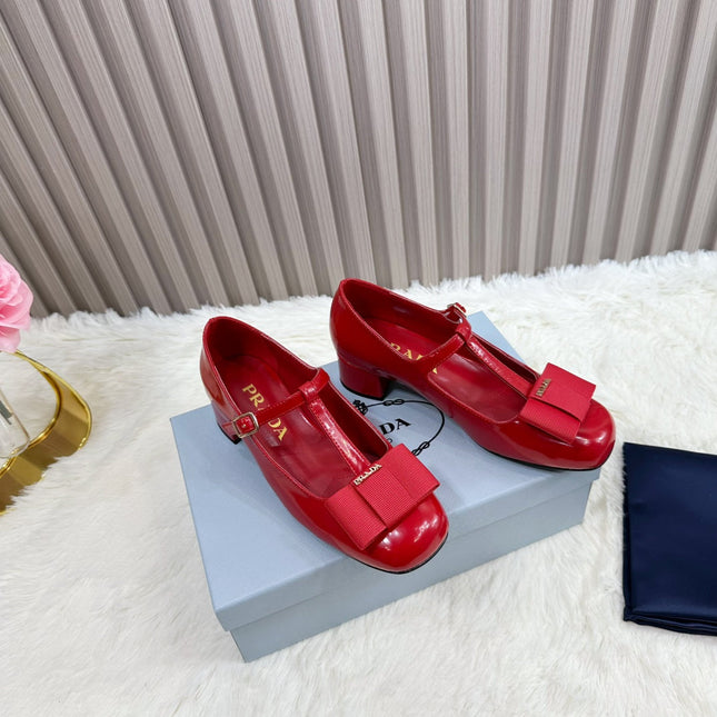 PRADA 26S T-STRAP MARY JANE PUMPS 40MM IN RED PATENT CALFSKIN WITH BOW