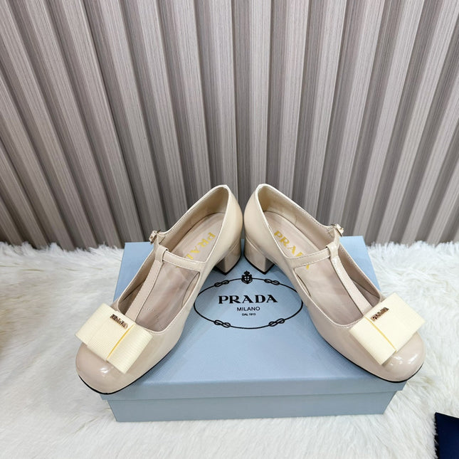 PRADA 26S T-STRAP MARY JANE PUMPS 40MM IN BEIGE PATENT CALFSKIN WITH BOW