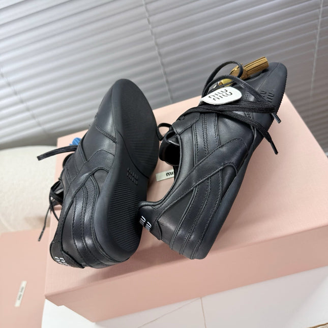 MIUMIU 26S GYMNASIUM SNEAKER IN BLACK CALFSKIN WITH GOLD BUCKLED STRAP