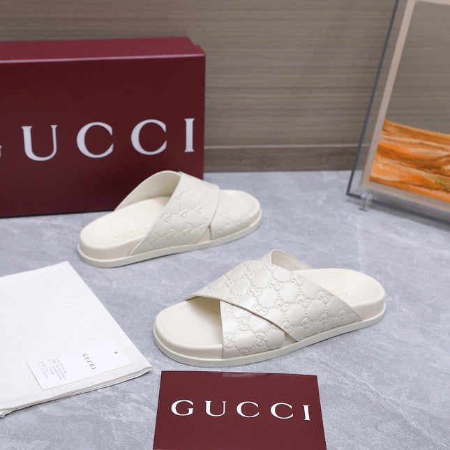 GUCCI 26S CROSSOVER SANDALS IN WHITE GG EMBOSSED CALFSKIN
