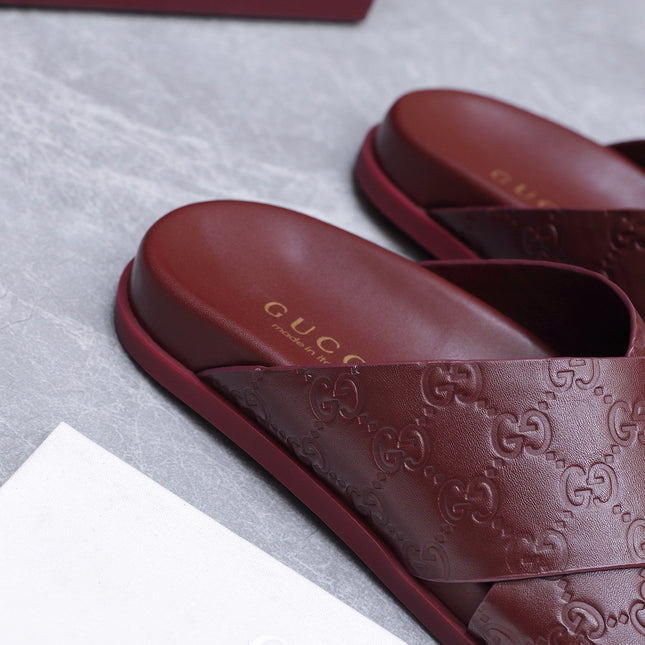 GUCCI 26S CROSSOVER SANDALS IN BURGUNDY RED GG EMBOSSED CALFSKIN