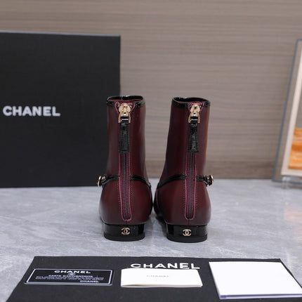 CHANEL 26S ANKLE BOOTS IN BURGUNDY CALFSKIN WITH BLACK PATENT LEATHER TRIM AND CC LOGO ON TOE CAP