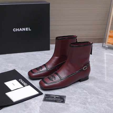 CHANEL 26S ANKLE BOOTS IN BURGUNDY CALFSKIN WITH BLACK PATENT LEATHER TRIM AND CC LOGO ON TOE CAP