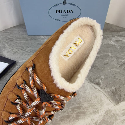 PRADA 26S WOVEN MULES IN COGNAC BROWN SUEDE