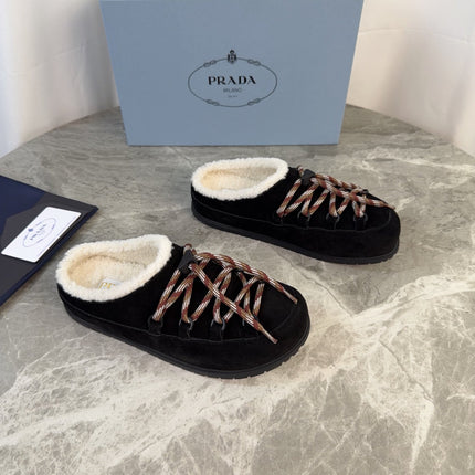 PRADA 26S WOVEN MULES IN BLACK SUEDE