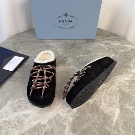 PRADA 26S WOVEN MULES IN BLACK SUEDE
