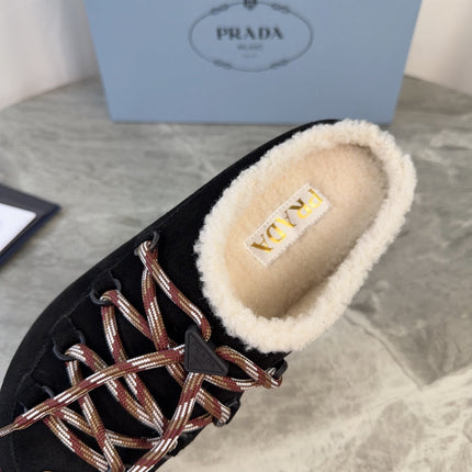 PRADA 26S WOVEN MULES IN BLACK SUEDE