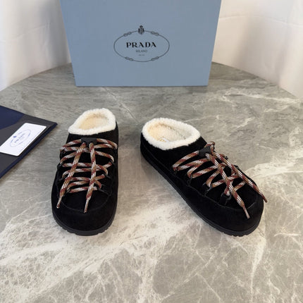 PRADA 26S WOVEN MULES IN BLACK SUEDE