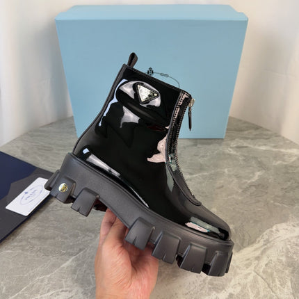 PRADA 26S ZIP-UP ANKLE BOOTS IN BLACK PATENT CALFSKIN