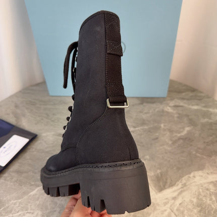 PRADA 26S LACE-UP COMBAT BOOTS IN BLACK CANVAS
