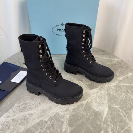 PRADA 26S LACE-UP COMBAT BOOTS IN BLACK CANVAS