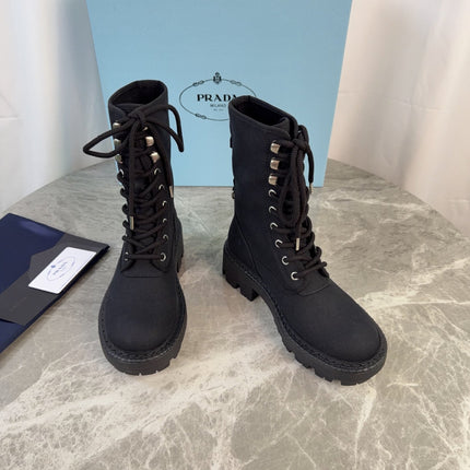 PRADA 26S LACE-UP COMBAT BOOTS IN BLACK CANVAS