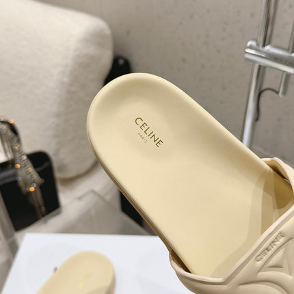 CELINE 26S TRIOMPHE SLIDES IN PASTEL YELLOW CALFSKIN