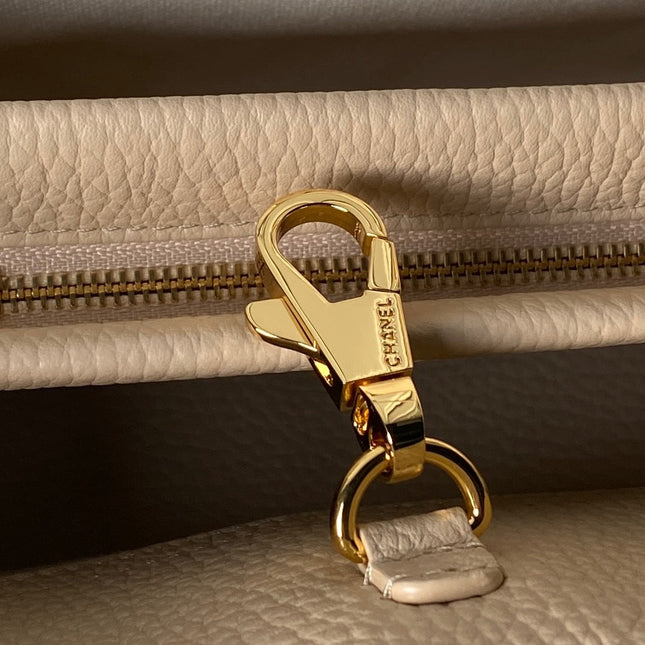 CHANEL 26S BOWLING BAGUETTE BAG 30CM IN BEIGE CAVIAR CALFSKIN