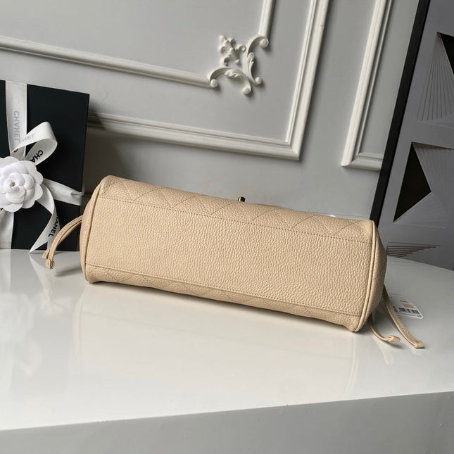 CHANEL 26S BOWLING BAGUETTE BAG 30CM IN BEIGE CAVIAR CALFSKIN