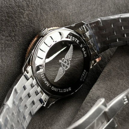 NAVITIMER AUTOMATIC 41 RED GOLD BEZEL WHITE AND BLACK DIAL