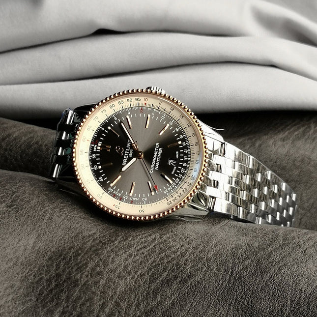 NAVITIMER AUTOMATIC 41 RED GOLD BEZEL WHITE AND BLACK DIAL